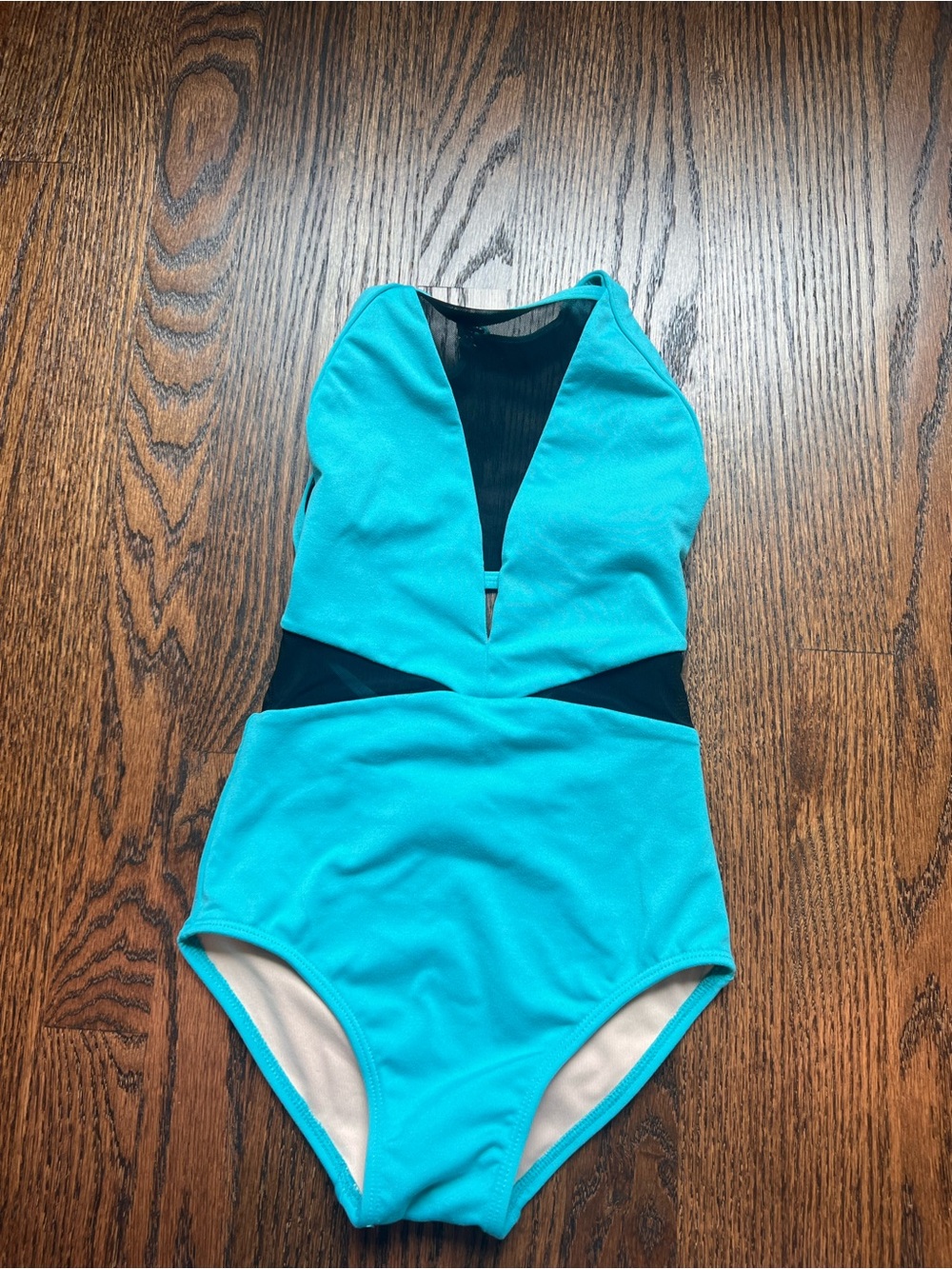 Jo and Jax Girls Bright Turquoise One-Piece dance leotard with Black Mesh